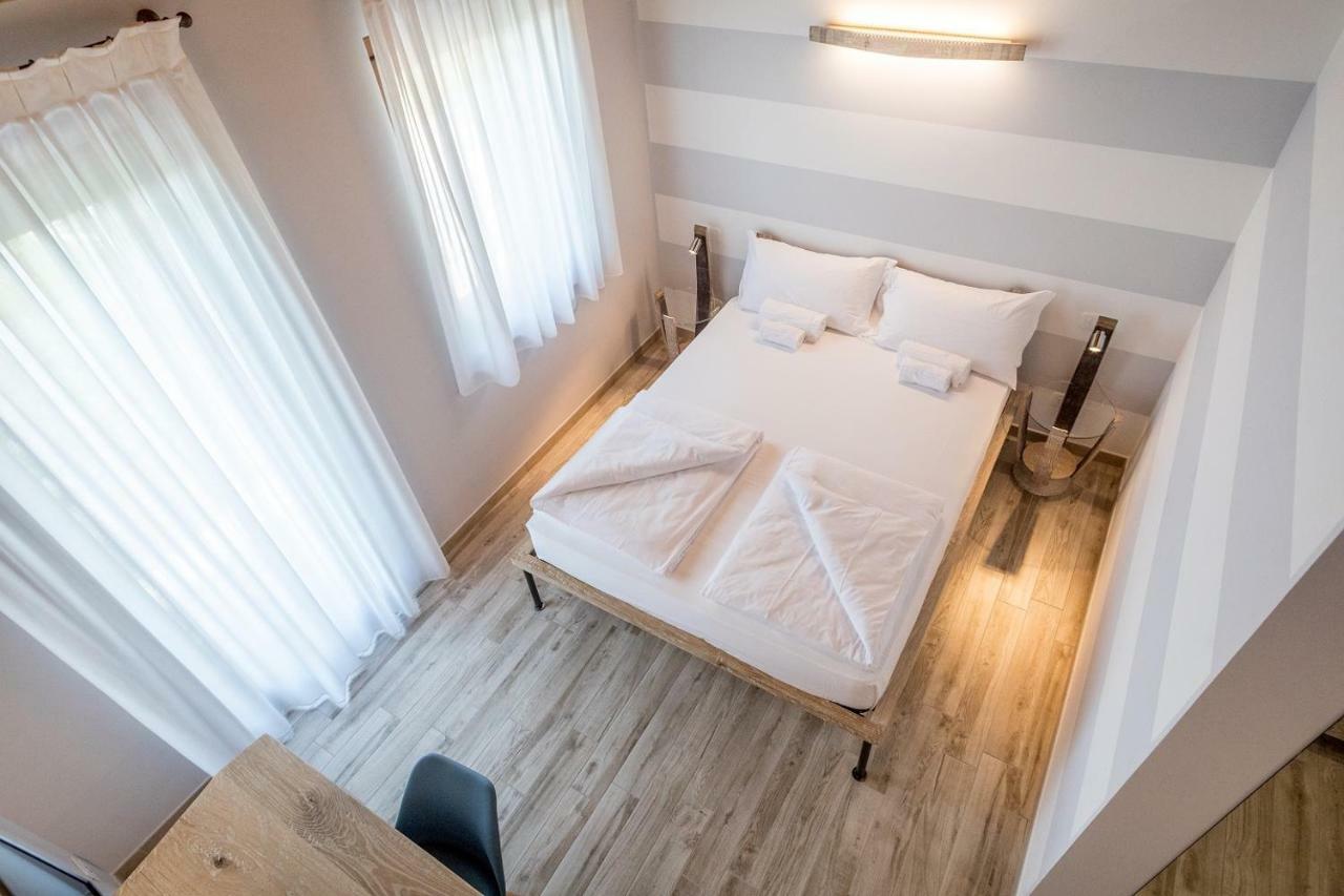 Double Room Small Balcony Partial Lake View,854331320:JPEG