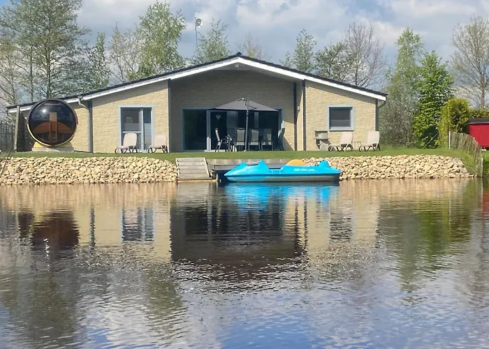 Ferienhaus am See mit Panorama Außensauna, hauseigenem Tretboot uvm. Twist