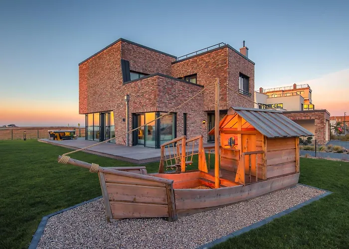 Villa King Erste Lage, Dachterrasse, Meerblick, Carport, Kamin, Sauna, Terrasse, Aussenrolllaeden Olpenitz