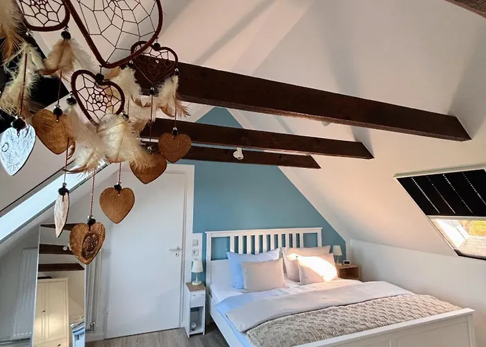 Lüttje Koje - Ferienhaus direkt am Deich und dem Meer dahinter Norden