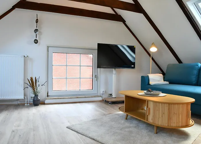 Lüttje Koje - Ferienhaus direkt am Deich und dem Meer dahinter Norden